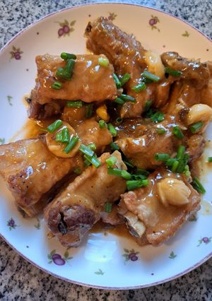 A picture of PorkRibs with Plum sauce.