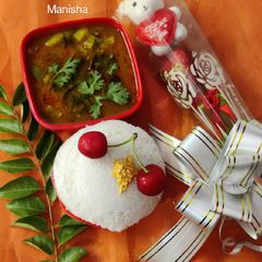 A picture of Healthy Spongy Idly With Eggplant Sambar.
