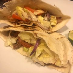 A picture of Pita sandwich stuffed with leftover pork shoulder.