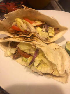 A picture of Pita sandwich stuffed with leftover pork shoulder.
