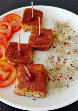 A picture of Cheese Tomato Sandwich Bites.
