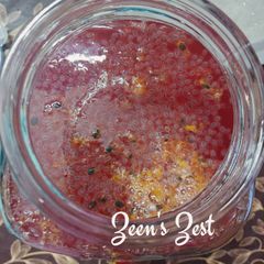 A picture of Roohafza and Passion Fruit Coolant with Chia Seeds.