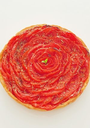 Une photo de Tarte à la tomate /oignon nouveau