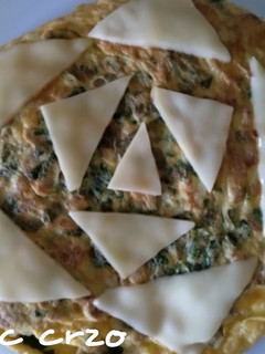 Una foto de Tortilla de perejil y queso