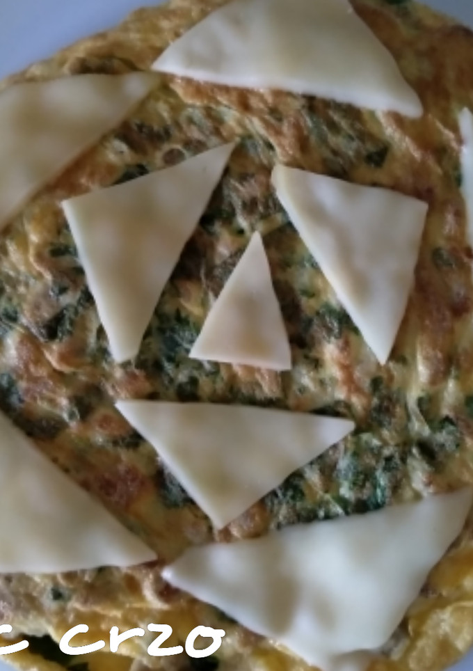 Una foto de Tortilla de perejil y queso