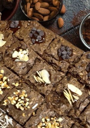 Foto di Tortino Cocco e Ricotta con Ganache al Latte di Cocco e Cioccolato