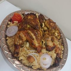 A picture of Chicken mandi roast.
