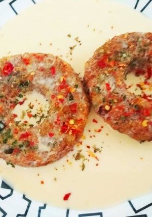 A picture of Rice Donuts in Cheese Sauce.