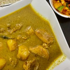 A picture of Green Coconut curry - serve with rice and instant kairi pickle.