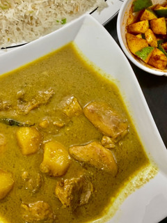 A picture of Green Coconut curry - serve with rice and instant kairi pickle.