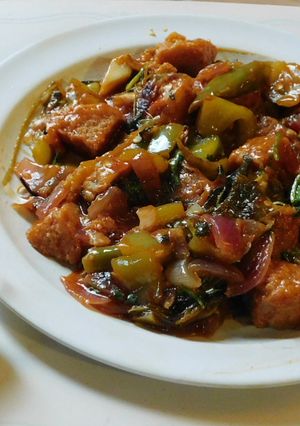 A picture of Chili idli fry with leftover idlies.