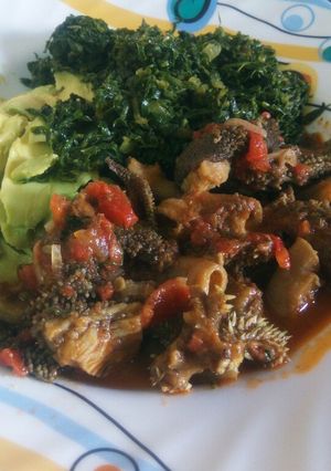 A picture of Stripes (matumbo) wet fry with greens.
