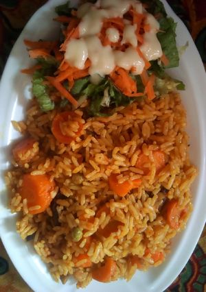 A picture of Fried rice with salad.