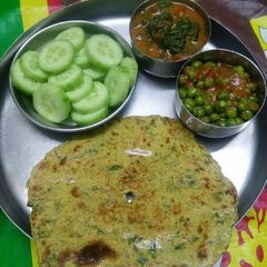A picture of Matar ki sabji palak ki sabji cucumber.