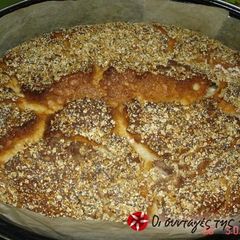 A picture of Bread without kneading in a Dutch oven.