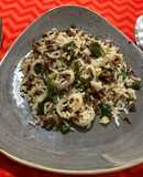 Cebollines con carne y arroz