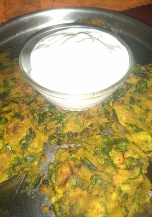 A picture of  PALANGA SAGA BHAJASpinach fritters.