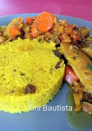 Una foto de Pollo con albaricoques y cuscús