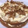 Coconut cake topped with caramelized coconut flakes