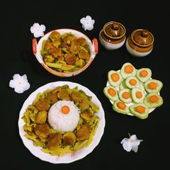 A picture of Lentil Fritters in mix Vegetable Curry.