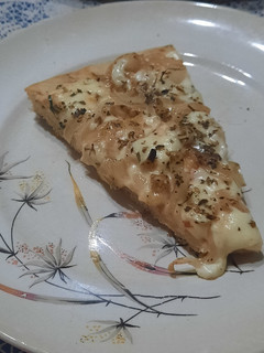 Una foto de Pizza de cebolla