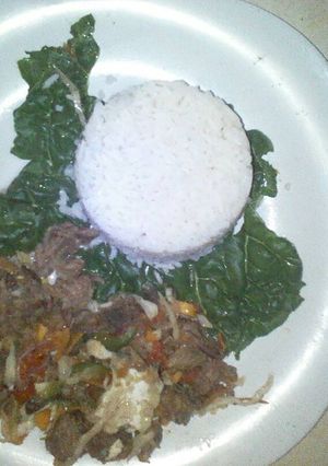 A picture of White rice,wet fly meat and spinach.