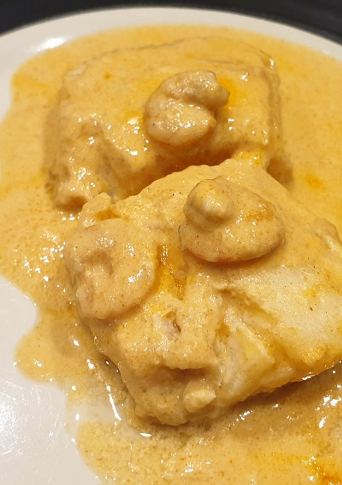 Una foto de Bacalao en salsa de gambas