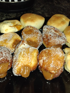Una foto de Berlinesas con dulce de leche