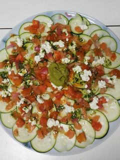 Una foto de Carpaccio de calabacín