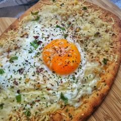 A picture of Baked Naan With Cheese, Egg & Chilli.