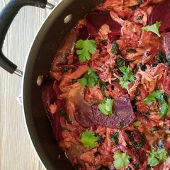 A picture of Chicken Curry with Roast Beets.