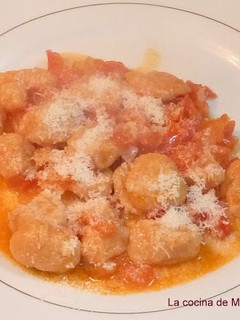 Una foto de Sorrentinos de ricota, jamón y muzzarella