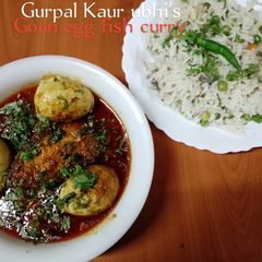 A picture of Goan egg fish curry 🐠🍅🥚🌿.