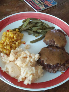 A picture of Hamburger Steak with Gravy.