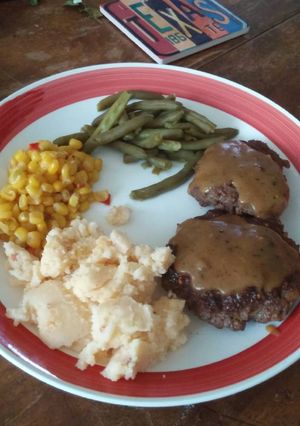 A picture of Hamburger Steak with Gravy.