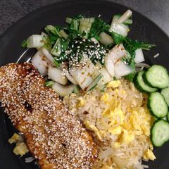 Sesame salmon with egg fried rice and paksoy A picture of Sesame salmon with egg fried rice and paksoy.