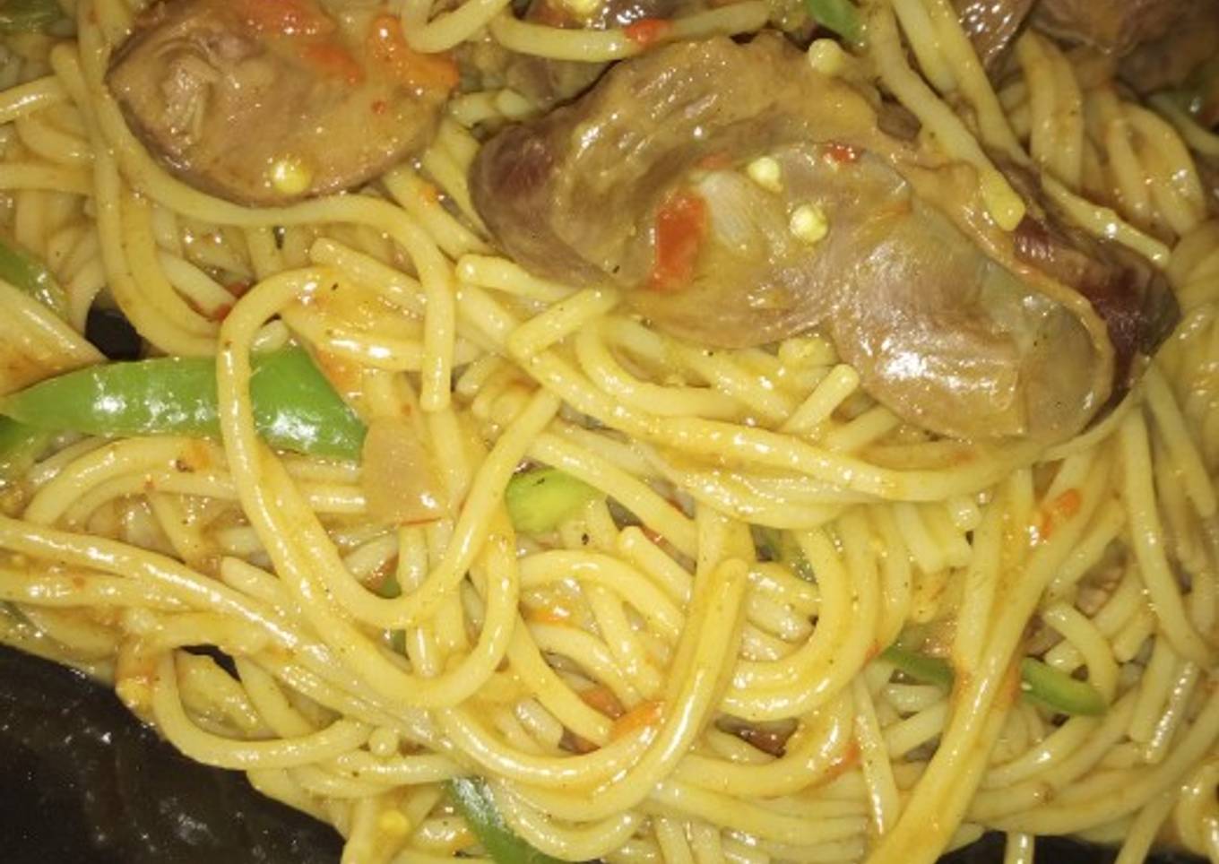 Spaghetti jollof with grilled gizzard