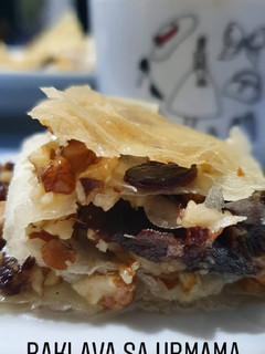 A picture of Baklava with dates.