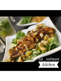 A picture of Chicken caesar salad.