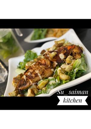 A picture of Chicken caesar salad.