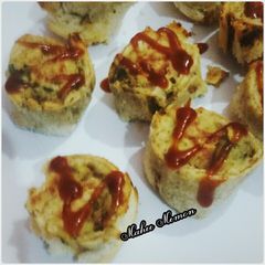 Baked chicken bread pin wheel roll A picture of Baked chicken bread pin wheel roll.