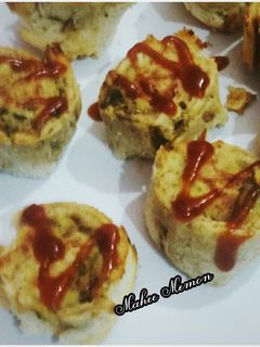 A picture of Baked chicken bread pin wheel roll.