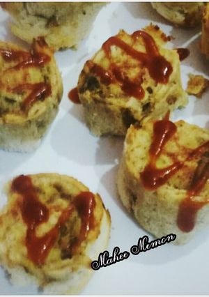 A picture of Baked chicken bread pin wheel roll.