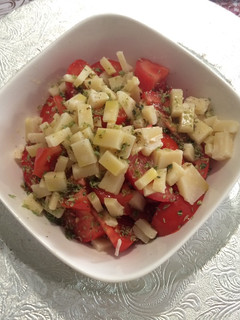 Una foto de Ensalada de tomate, orégano y Parmigiano