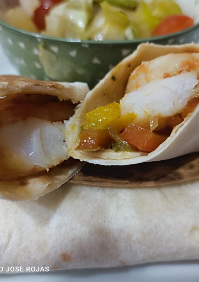 Una foto de Langostinos con especias cajún