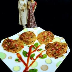 A picture of Semolina-Veggies Mini Uttapam.