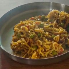 A picture of Maggi With Green Matar/ Vegetable Atta Maggi/ Delicious Matar Maggi For Little Craving 🤩.