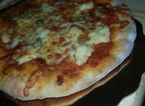 Une photo de Pizza