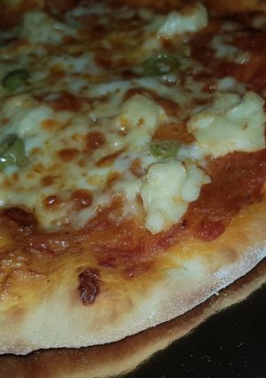 Une photo de Pizza