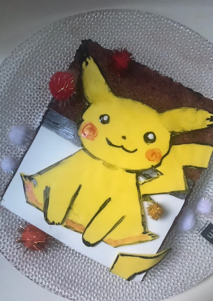 Una foto de Tarta de Pikachu, facilita